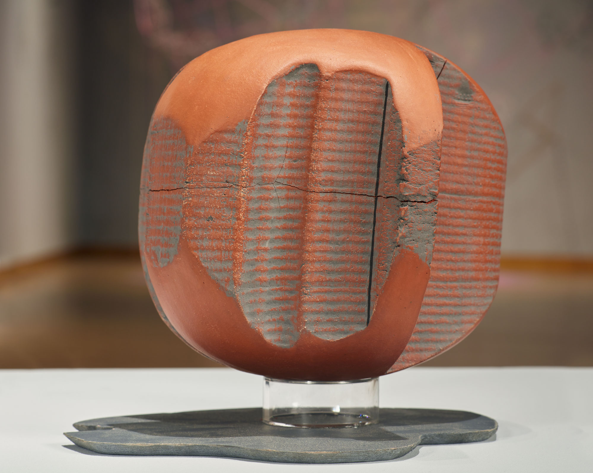 Kodi Thompson, Grey Spheroid, 2021. ceramic, underglaze, MDF. 9 x 9 x 9 in. Courtesy of the artist. Installation view of Skyway 20/21 exhibition at USF Contemporary Art Museum. Photo: Will Lytch.